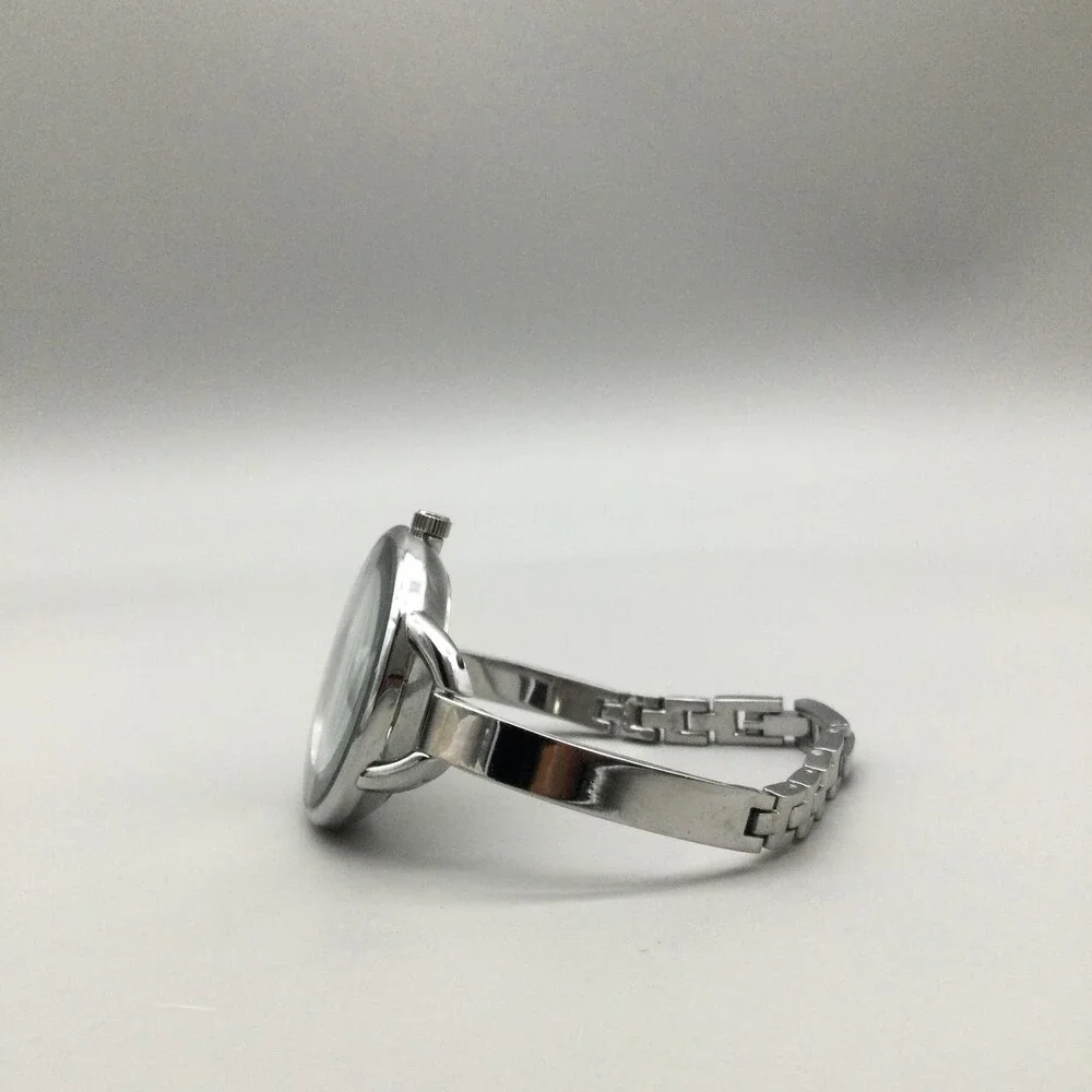 Anne Klein AK/1209 Womens Watch 35mm Silver Tone Black Dial Dress Bangle 6.75
